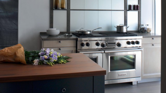 A charming kitchen featuring a top-of-the-line Wolf kitchen range