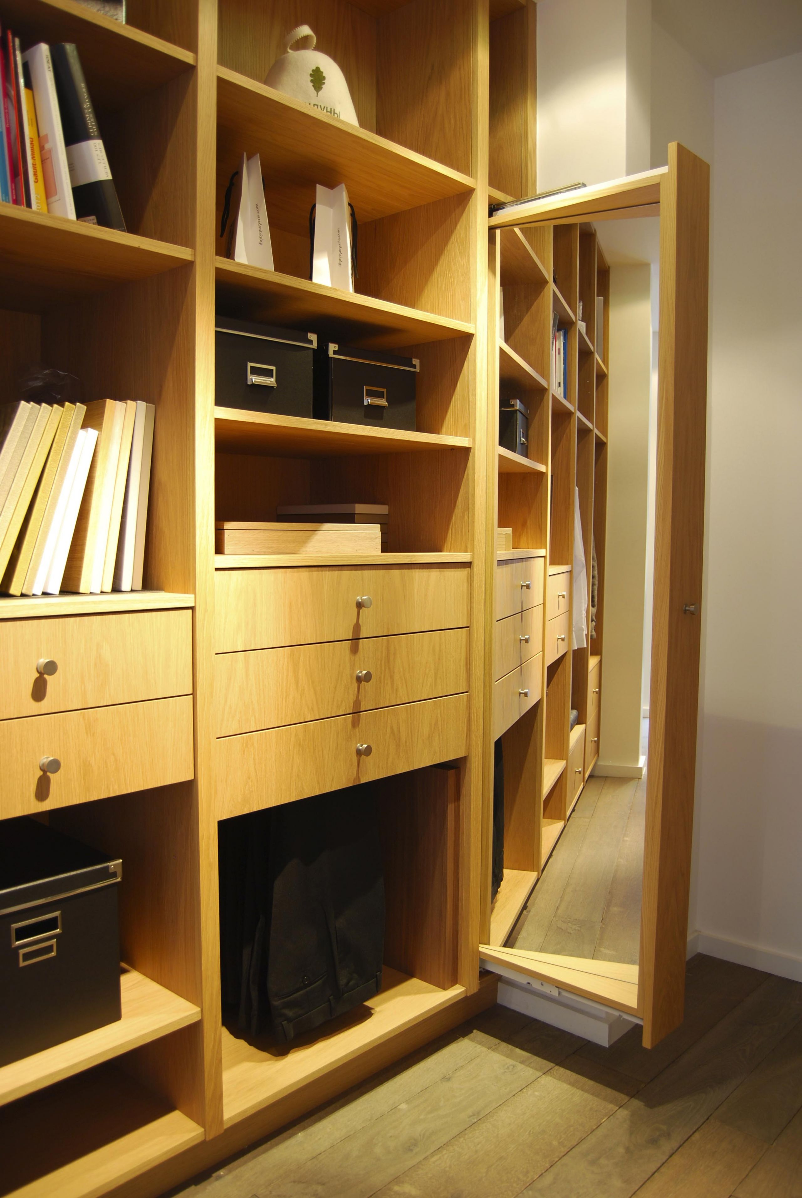 A custom closet pairing wood and leather