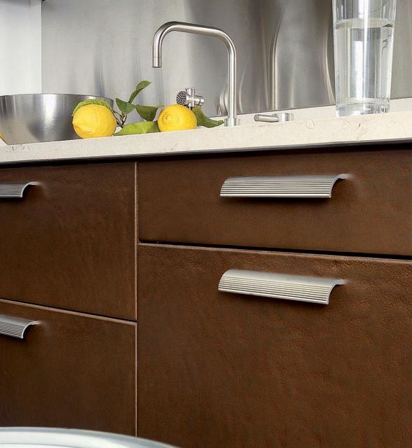 A bold kitchen with cool metallic elements and robust textures - 4