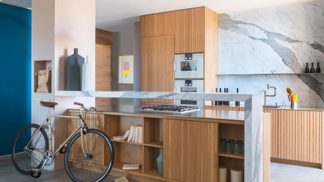 A contemporary style kitchen dressed in the sophisticated warmth of wood.